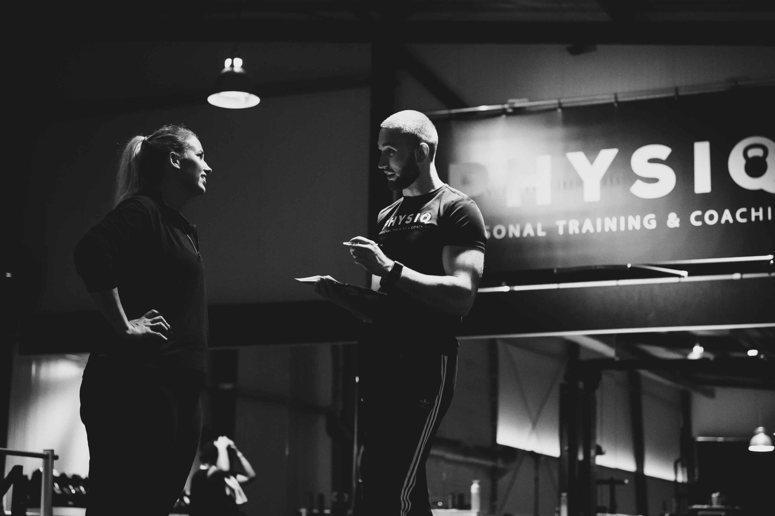 PhysIQ Talking with personal trainer
